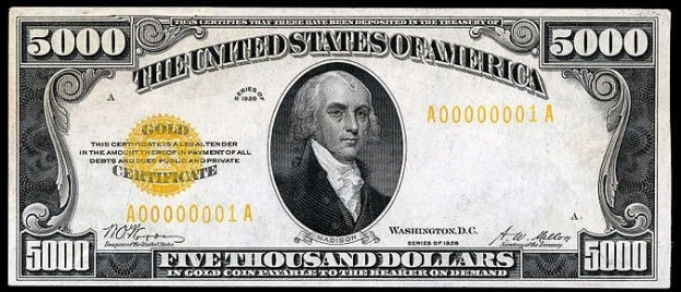 Ein schwarzer Hintergrund mit einem United States-Fünfausend-Dollar-Schein mit einem Porträt von George Washington und fetter Schrift, die "United States" und "Fünfausend Dollar" liest.