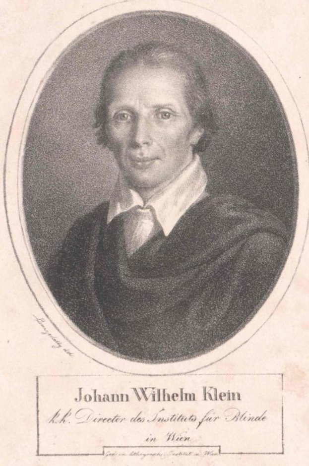 Schwarzes und weißes Porträt von Johann Wilhelm Klein, dem Direktor des Instituts für Blinde in Wien, der eine weiße Hemd und einen ernsten Gesichtsausdruck trägt, mit deutschem Text unten.