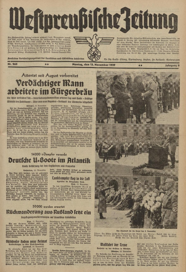 Schwarze-weiße Titelseite einer deutschen Zeitung vom 13. November 1939 mit der Überschrift "Weitpreubliche Zeitung" und einem Foto von Menschen in traditioneller deutscher Tracht, die zu feiern scheinen.