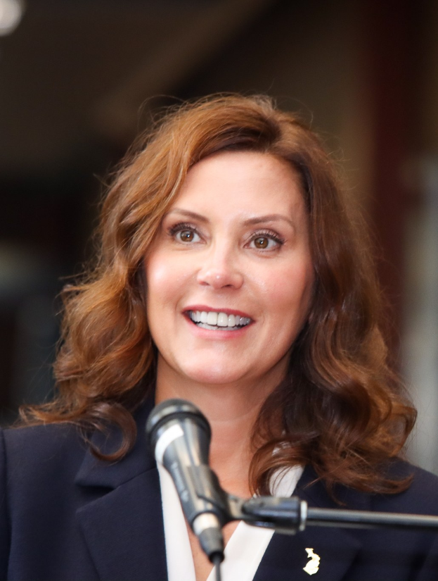 Eine als Michele Bachmann identifizierte Frau spricht in ein Mikrofon auf einem formellen Event.